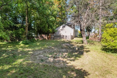 Spacious and updated, this 5-bedroom, 2-bathroom home offers 2 on IMA Brookwood Golf Course in Michigan - for sale on GolfHomes.com, golf home, golf lot