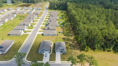 Tucked away on a quiet street, this elegant one-owner home on Carolina Colours Golf Club in North Carolina - for sale on GolfHomes.com, golf home, golf lot