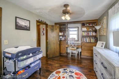 Nestled on an amazing nearly one-acre lot, this beautifully on Prairie Creek Golf Course in Michigan - for sale on GolfHomes.com, golf home, golf lot