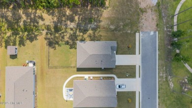 Tucked away on a quiet street, this elegant one-owner home on Carolina Colours Golf Club in North Carolina - for sale on GolfHomes.com, golf home, golf lot