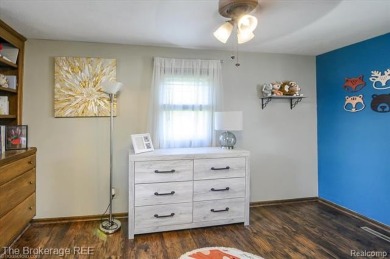 Nestled on an amazing nearly one-acre lot, this beautifully on Prairie Creek Golf Course in Michigan - for sale on GolfHomes.com, golf home, golf lot