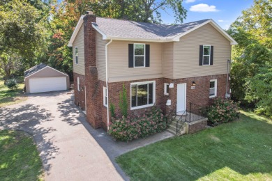 Spacious and updated, this 5-bedroom, 2-bathroom home offers 2 on IMA Brookwood Golf Course in Michigan - for sale on GolfHomes.com, golf home, golf lot