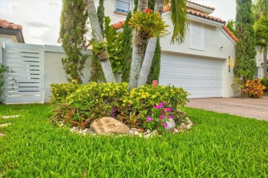 WELCOME TO YOUR DREAM HOME IN THE DESIRABLE DORAL GLEN COMMUNITY on Jim McLean Signature Course in Florida - for sale on GolfHomes.com, golf home, golf lot