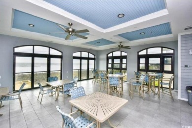 Highly sought-after Saratoga model with first floor master on Barefoot Resort and Golf Club - Norman Course in South Carolina - for sale on GolfHomes.com, golf home, golf lot