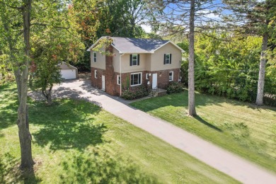 Spacious and updated, this 5-bedroom, 2-bathroom home offers 2 on IMA Brookwood Golf Course in Michigan - for sale on GolfHomes.com, golf home, golf lot