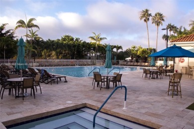 WELCOME TO YOUR DREAM HOME IN THE DESIRABLE DORAL GLEN COMMUNITY on Jim McLean Signature Course in Florida - for sale on GolfHomes.com, golf home, golf lot