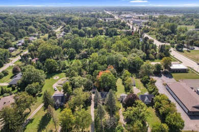Spacious and updated, this 5-bedroom, 2-bathroom home offers 2 on IMA Brookwood Golf Course in Michigan - for sale on GolfHomes.com, golf home, golf lot