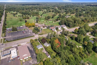 Spacious and updated, this 5-bedroom, 2-bathroom home offers 2 on IMA Brookwood Golf Course in Michigan - for sale on GolfHomes.com, golf home, golf lot