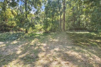 Spacious and updated, this 5-bedroom, 2-bathroom home offers 2 on IMA Brookwood Golf Course in Michigan - for sale on GolfHomes.com, golf home, golf lot