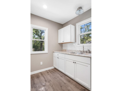 Spacious and updated, this 5-bedroom, 2-bathroom home offers 2 on IMA Brookwood Golf Course in Michigan - for sale on GolfHomes.com, golf home, golf lot