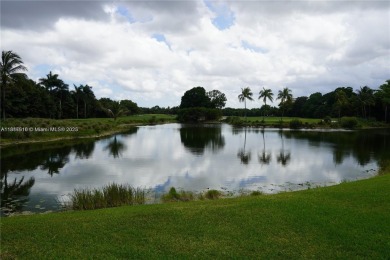 WELCOME TO YOUR DREAM HOME IN THE DESIRABLE DORAL GLEN COMMUNITY on Jim McLean Signature Course in Florida - for sale on GolfHomes.com, golf home, golf lot