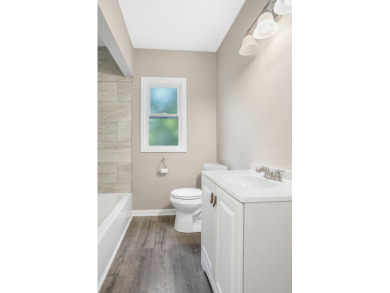 Spacious and updated, this 5-bedroom, 2-bathroom home offers 2 on IMA Brookwood Golf Course in Michigan - for sale on GolfHomes.com, golf home, golf lot