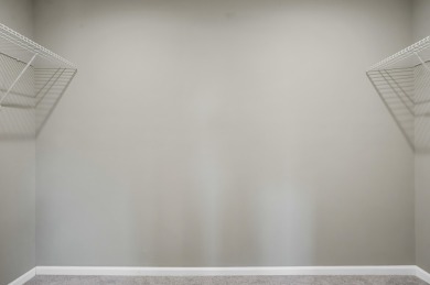 Spacious and updated, this 5-bedroom, 2-bathroom home offers 2 on IMA Brookwood Golf Course in Michigan - for sale on GolfHomes.com, golf home, golf lot