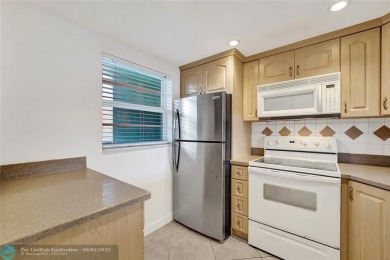 Back on market--no fault of the seller! Buyer's financing fell on Pine Island Ridge Country Club in Florida - for sale on GolfHomes.com, golf home, golf lot
