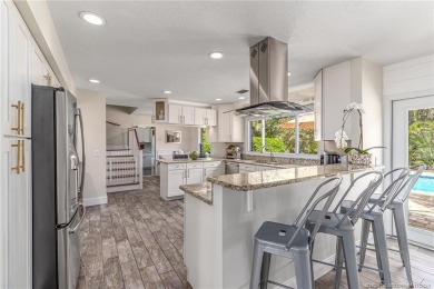 Welcome to this meticulously remodeled 4-bedroom, 3-bathroom on Yacht and Country Club in Florida - for sale on GolfHomes.com, golf home, golf lot