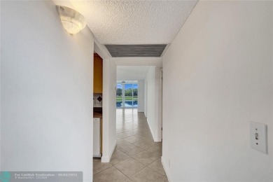 Back on market--no fault of the seller! Buyer's financing fell on Pine Island Ridge Country Club in Florida - for sale on GolfHomes.com, golf home, golf lot