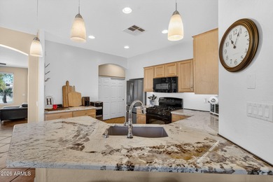 This standout property offers features you rarely find together on Aguila Golf Course - Aguila in Arizona - for sale on GolfHomes.com, golf home, golf lot