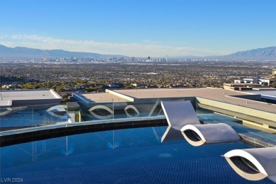 Positioned high above Las Vegas in prestigious MacDonald on Dragon Ridge Country Club in Nevada - for sale on GolfHomes.com, golf home, golf lot