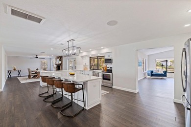 NO FLOODING OR HURRICANE DAMAGE Ultimate peace of mind awaits in on Seminole Lake Country Club in Florida - for sale on GolfHomes.com, golf home, golf lot