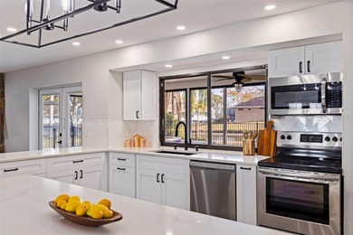 NO FLOODING OR HURRICANE DAMAGE Ultimate peace of mind awaits in on Seminole Lake Country Club in Florida - for sale on GolfHomes.com, golf home, golf lot