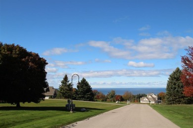 SPECTACULAR LAKE MICHIGAN VIEWS with beautiful views of the on Crooked Tree Golf Club in Michigan - for sale on GolfHomes.com, golf home, golf lot