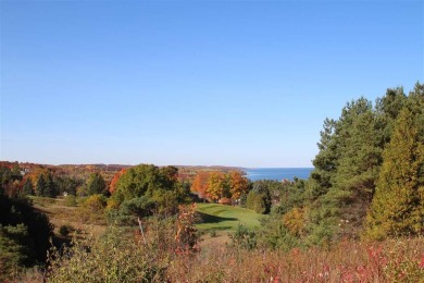 SPECTACULAR LAKE MICHIGAN VIEWS with beautiful views of the on Crooked Tree Golf Club in Michigan - for sale on GolfHomes.com, golf home, golf lot