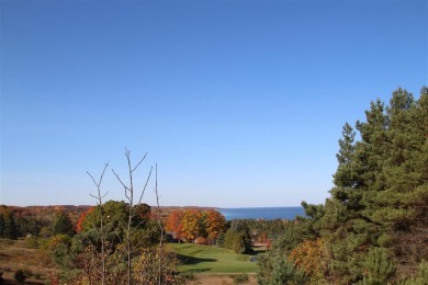 SPECTACULAR LAKE MICHIGAN VIEWS with beautiful views of the on Crooked Tree Golf Club in Michigan - for sale on GolfHomes.com, golf home, golf lot