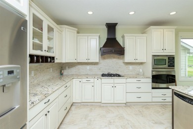 Imagine walking into a home and at once seeing panoramic views on Wakonda Club in Iowa - for sale on GolfHomes.com, golf home, golf lot
