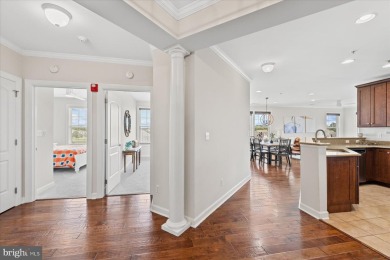Discover your dream retreat in this stunning top-floor end unit on Bayside Resort Golf Club in Delaware - for sale on GolfHomes.com, golf home, golf lot