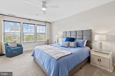 Discover your dream retreat in this stunning top-floor end unit on Bayside Resort Golf Club in Delaware - for sale on GolfHomes.com, golf home, golf lot