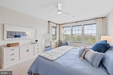 Discover your dream retreat in this stunning top-floor end unit on Bayside Resort Golf Club in Delaware - for sale on GolfHomes.com, golf home, golf lot
