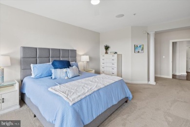 Discover your dream retreat in this stunning top-floor end unit on Bayside Resort Golf Club in Delaware - for sale on GolfHomes.com, golf home, golf lot