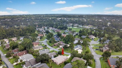 Discover the charm of this 3 bedroom, 2 and 1/2 bath home in the on The Club At Pelican Bay - North Course in Florida - for sale on GolfHomes.com, golf home, golf lot