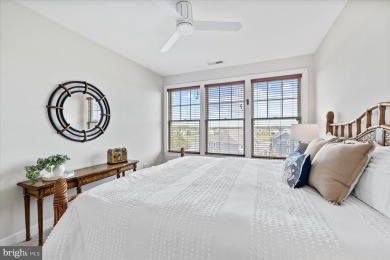 Discover your dream retreat in this stunning top-floor end unit on Bayside Resort Golf Club in Delaware - for sale on GolfHomes.com, golf home, golf lot