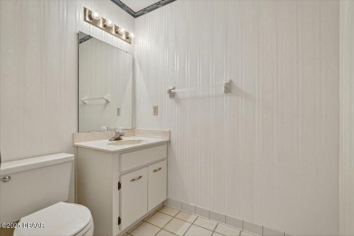Discover the charm of this 3 bedroom, 2 and 1/2 bath home in the on The Club At Pelican Bay - North Course in Florida - for sale on GolfHomes.com, golf home, golf lot