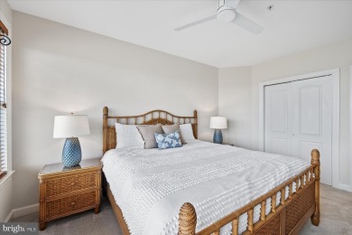 Discover your dream retreat in this stunning top-floor end unit on Bayside Resort Golf Club in Delaware - for sale on GolfHomes.com, golf home, golf lot