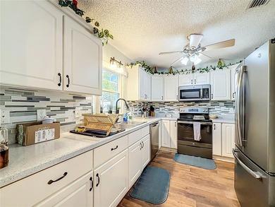 Welcome to this beautifully maintained Olympia model villa in on On Top of the World Golf Course in Florida - for sale on GolfHomes.com, golf home, golf lot