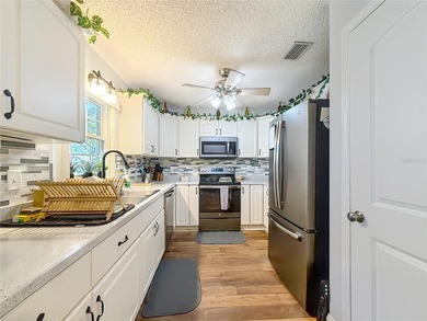 Welcome to this beautifully maintained Olympia model villa in on On Top of the World Golf Course in Florida - for sale on GolfHomes.com, golf home, golf lot