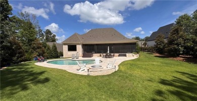 Enjoy the tranquility of this private oasis situated on almost 1 on The Auburn University Club in Alabama - for sale on GolfHomes.com, golf home, golf lot