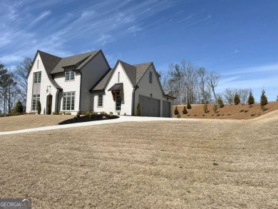MAJOR PRICE IMPROVEMENT - MOVE-IN READY AND PRICED TO SELL! on The Governors Towne Club in Georgia - for sale on GolfHomes.com, golf home, golf lot