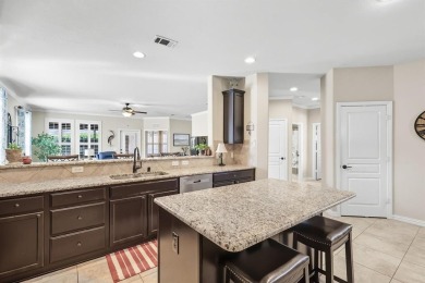 Stunning Surrey Crest Model located in the 55+ community of on Frisco Lakes Golf Course in Texas - for sale on GolfHomes.com, golf home, golf lot