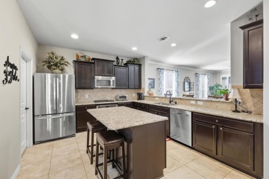 Stunning Surrey Crest Model located in the 55+ community of on Frisco Lakes Golf Course in Texas - for sale on GolfHomes.com, golf home, golf lot