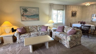 Welcome home to this well-kept secret called Cambridge Village on IMG Academies Golf and Country Club in Florida - for sale on GolfHomes.com, golf home, golf lot