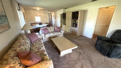 Welcome home to this well-kept secret called Cambridge Village on IMG Academies Golf and Country Club in Florida - for sale on GolfHomes.com, golf home, golf lot