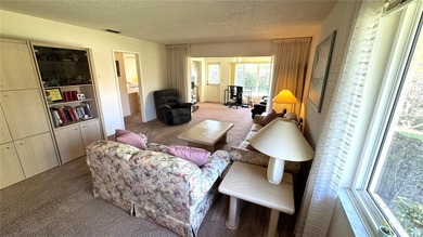 Welcome home to this well-kept secret called Cambridge Village on IMG Academies Golf and Country Club in Florida - for sale on GolfHomes.com, golf home, golf lot