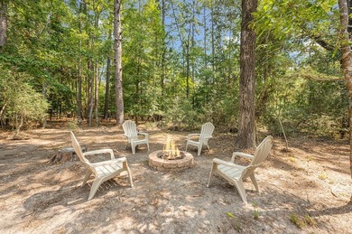 Nestled in the serene embrace of Rayburn Country Resort on Lake on Rayburn Country Club in Texas - for sale on GolfHomes.com, golf home, golf lot