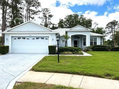PRICE REDUCED!! This rare Oakhill Model has been nicely updated on Heritage Pines Country Club in Florida - for sale on GolfHomes.com, golf home, golf lot