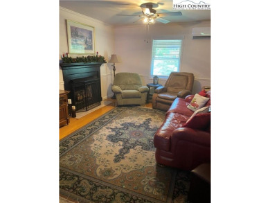 Welcome to this beautifully updated year-round home in Linville on Land Harbor Golf Course in North Carolina - for sale on GolfHomes.com, golf home, golf lot