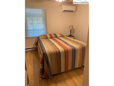 Welcome to this beautifully updated year-round home in Linville on Land Harbor Golf Course in North Carolina - for sale on GolfHomes.com, golf home, golf lot
