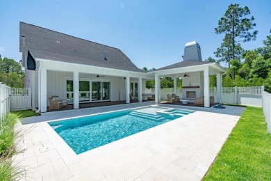 Experience elevated coastal living in the Suffolk II by Romair on Origins Golf Club in Florida - for sale on GolfHomes.com, golf home, golf lot